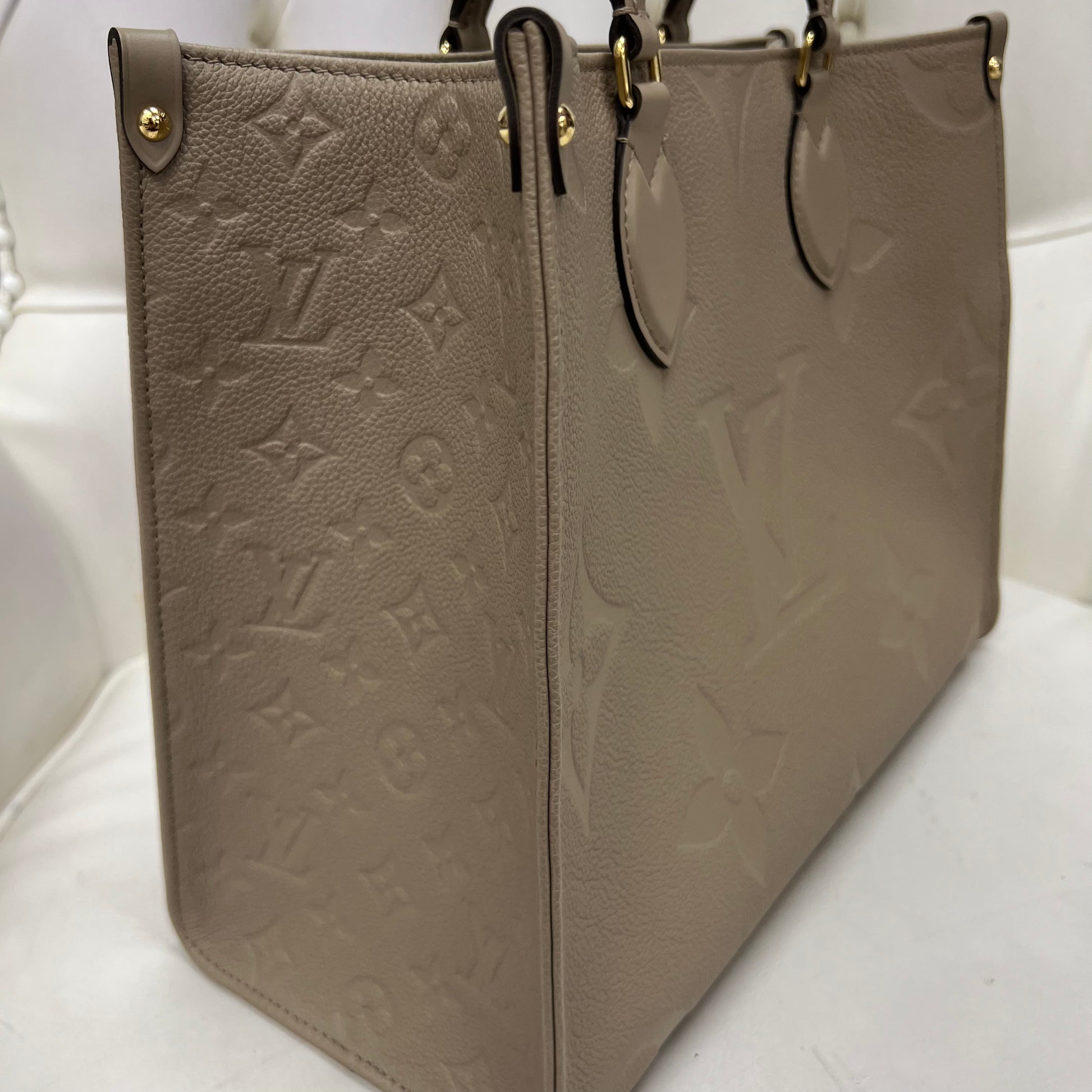 Did some retail therapy! OTG empreinte in Turtledove with a matching belt  and wallet. : r/Louisvuitton